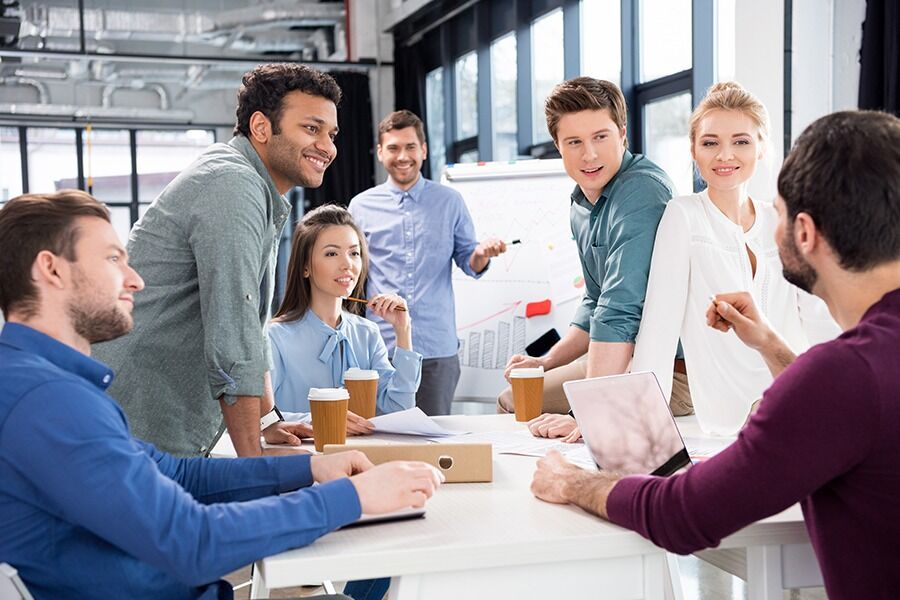 Group of people in a meeting concept image for IT project management in education