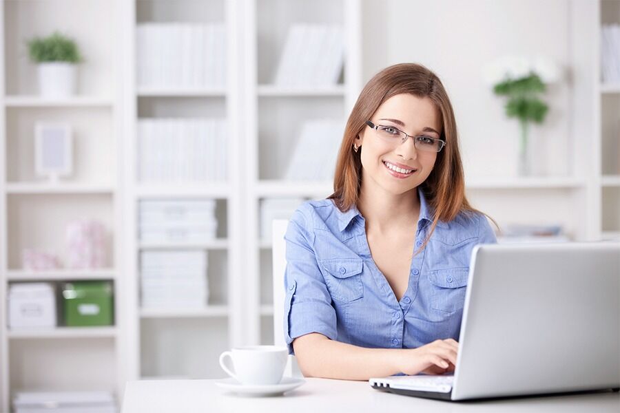 Young lady working using home based cloud computing solutions