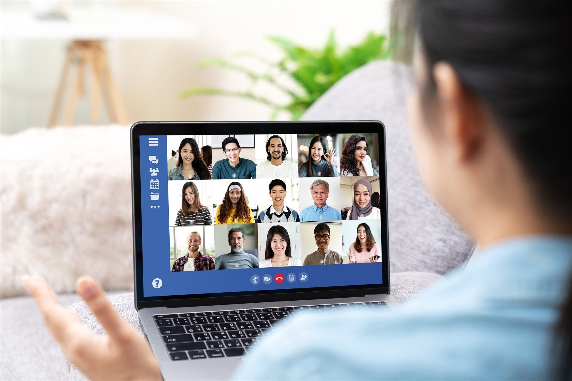 Young lady engaging in a virtual meeting from her home office, utilizing residential cloud solutions for seamless connectivity.