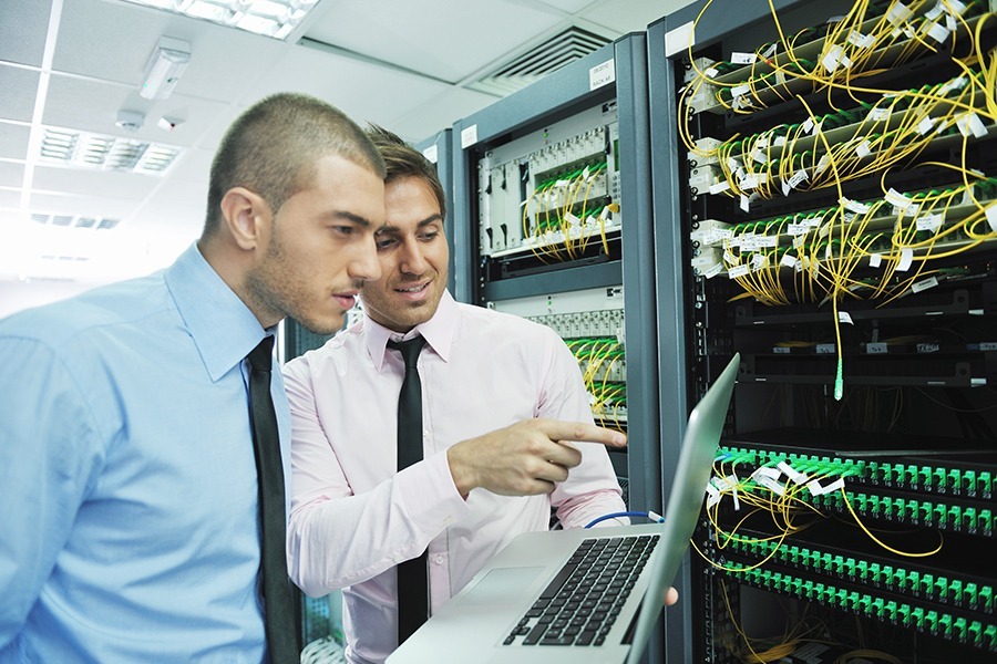Expert IT network engineers conducting thorough Network Security Auditing Expert IT network engineers conducting thorough Network Security Auditing