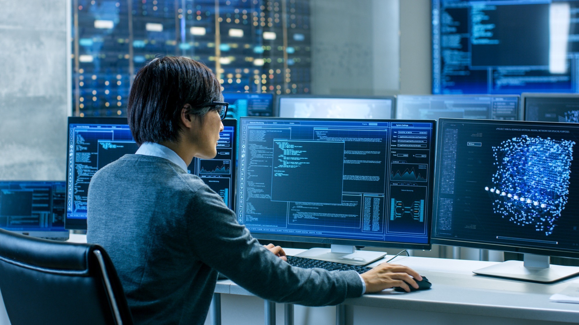 In the System Control Room Technical Operator Works at His Works IT specialist monitors system and network as part of EIRE Systems IT security services