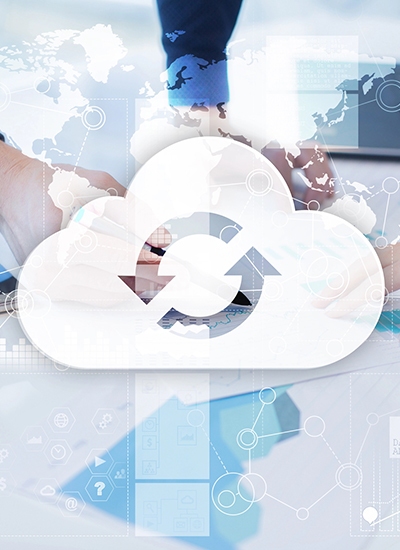 Business professionals analyzing data with digital cloud computing graphics overlay, representing business cloud services in Japan. Business professionals analyzing data with digital cloud computing graphics overlay, representing business cloud services in Japan.