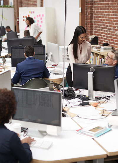 Business professionals collaborating in an office with optimized WiFi performance, ensuring seamless connectivity and increased productivity Japanese business professionals collaborating in an office with optimized WiFi performance, ensuring seamless connectivity and increased productivity