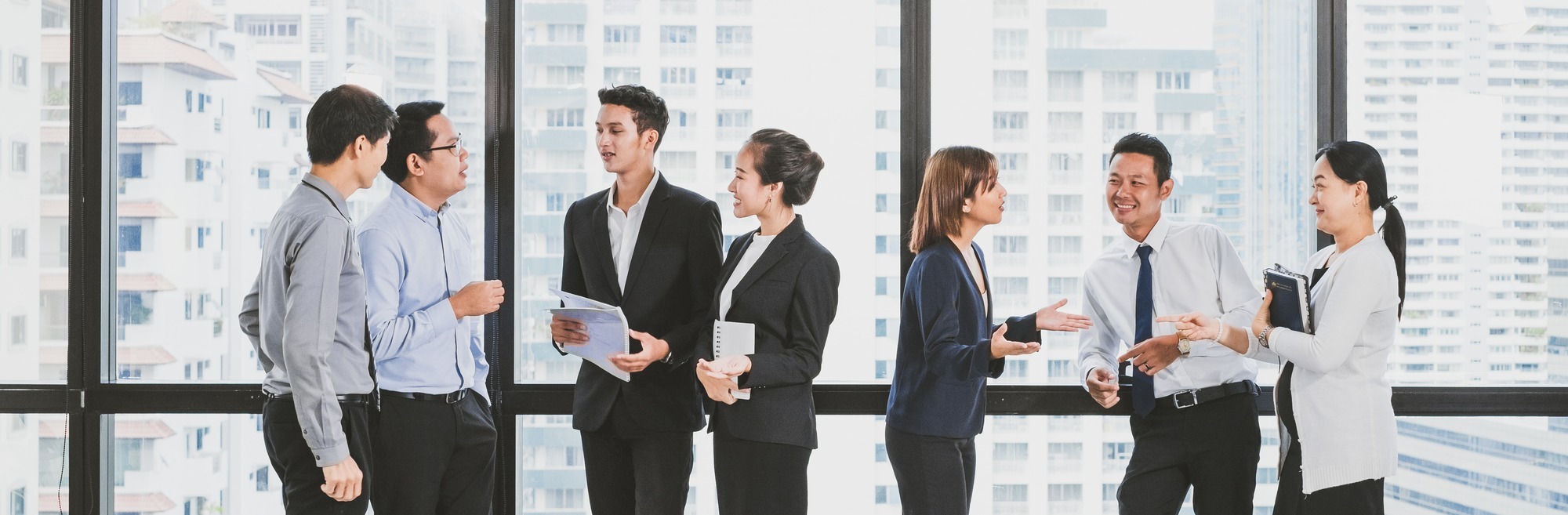 Group of Asian business people in formal suit standing and meeti Depositphotos 383352909 L