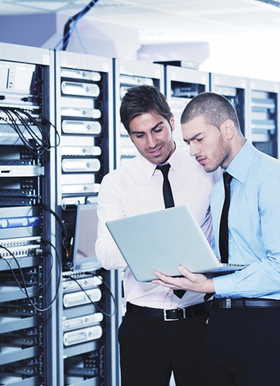 IT engineers optimizing wireless networks for Wi-Fi design services in Hong Kong