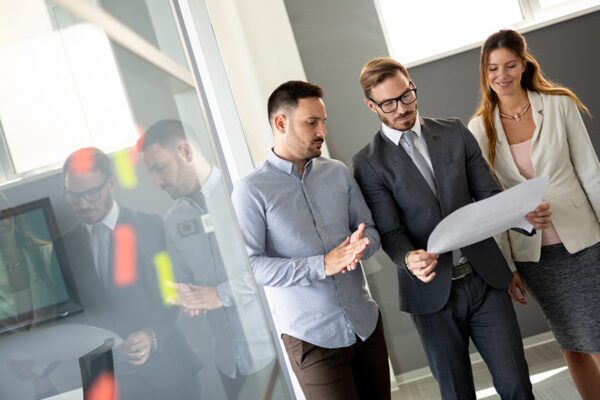 Importance of Project Risk Management 3 Business team conducting inspection, highlighting the importance of risk management plans