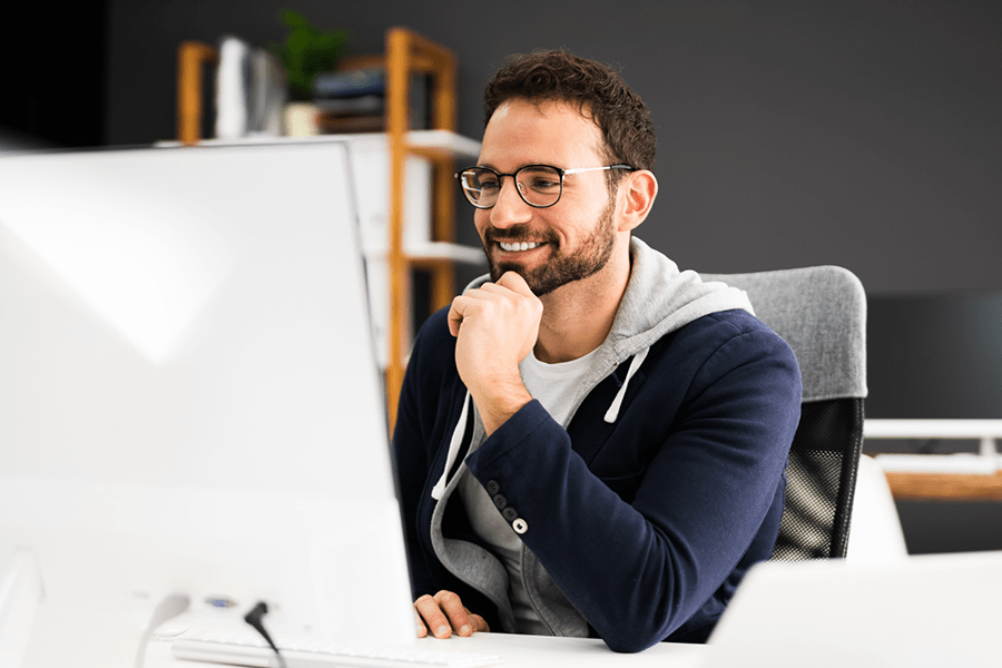 IT personnel working on a computer concept image for IT concierge services for manufacturing