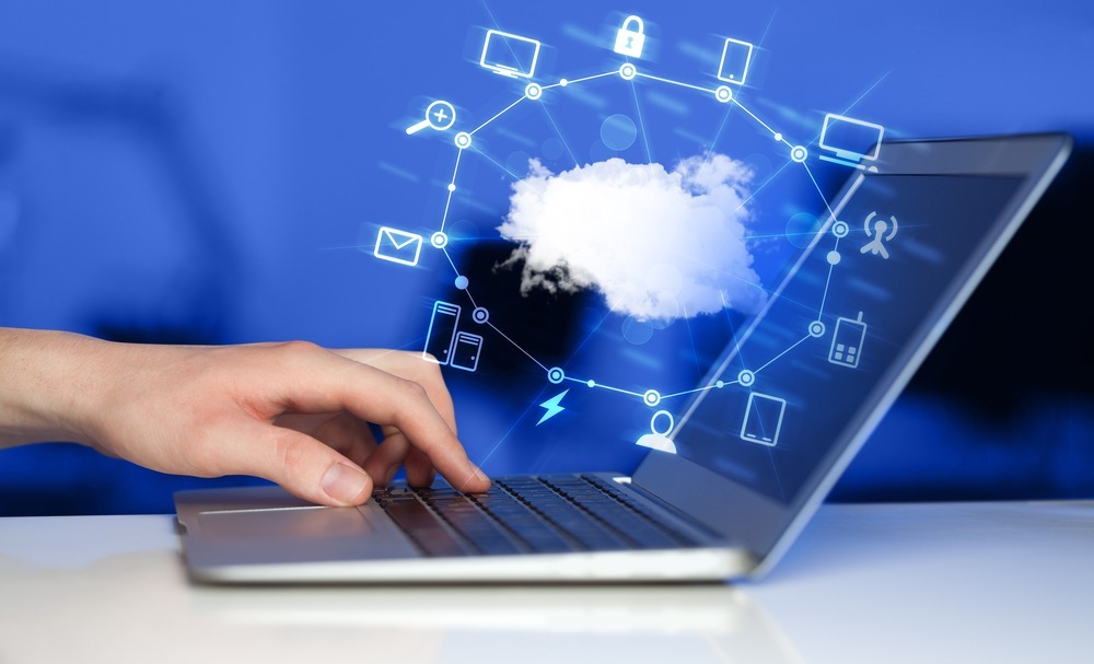 Business Benefits of Hybrid Cloud 2 Hand on computer concept showing the business benefits of hybrid cloud. A hybrid cloud environment comprises a combination of private cloud services, public cloud services, and on-prem infrastructure.