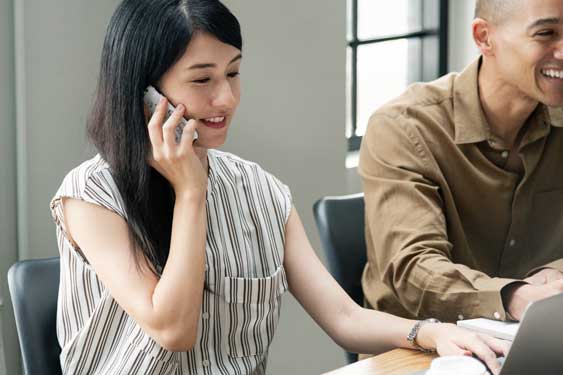 team working on IT support in their Tokyo Japan office