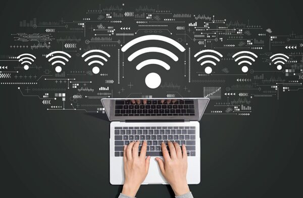 Conducting wifi assessment on a laptop, showcasing network analysis