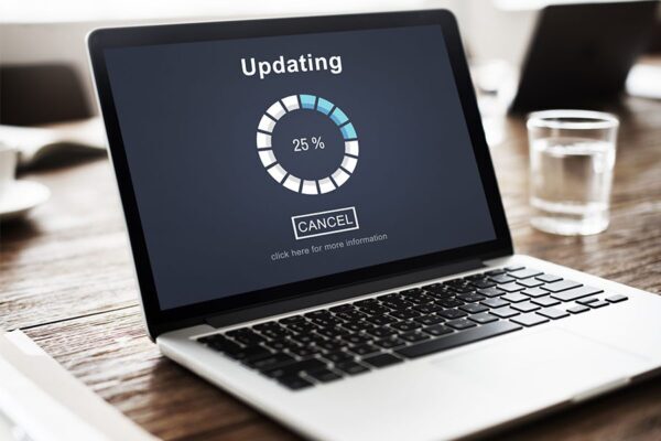 How to Protect Your Business From Ransomware 3 updating on laptop concept image for security software update.