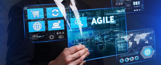 Agile project management concept showing a business professional interacting with a digital interface featuring data dashboards, workflow icons, and the word “Agile” on a virtual screen.