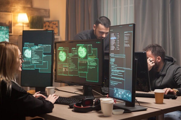 Healthcare Data Security: Identifying Challenges and Offering Solutions 4 IT security professionals monitoring system to prevent healthcare data breach
