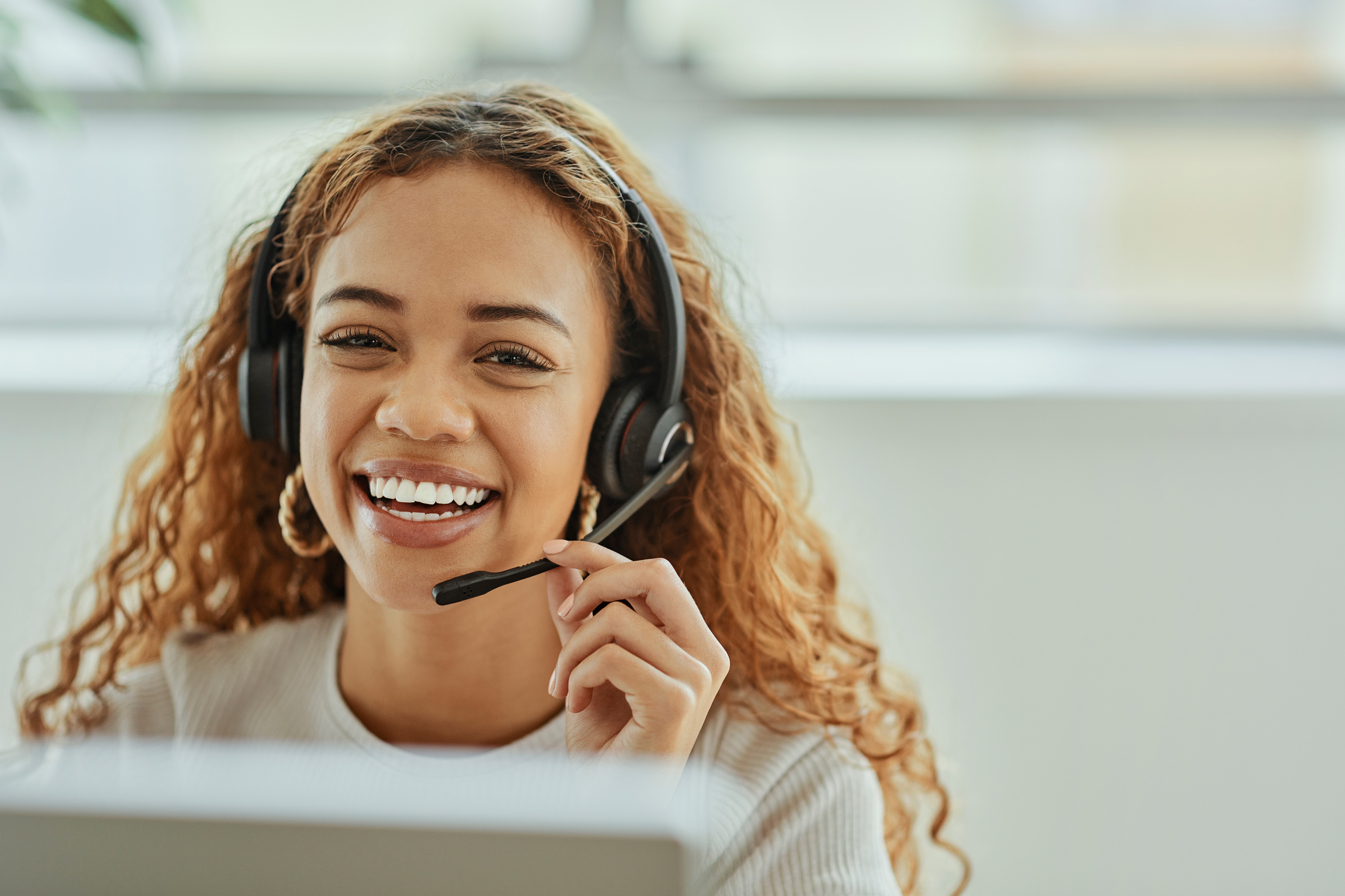 Young lady providing IT support services Young lady providing IT support services