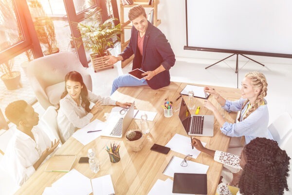 Importance of Project Risk Management 4 Project team collaborating seamlessly, exemplifying the risk management process