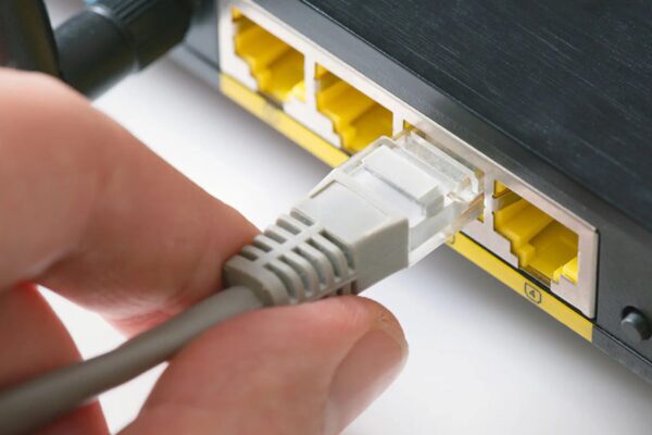 Plugging the cable to the ethernet port.